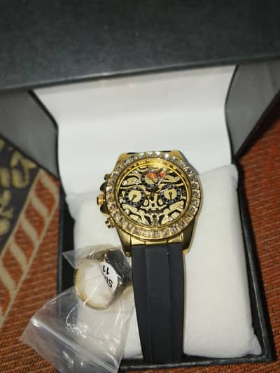 Rolex watch and ring