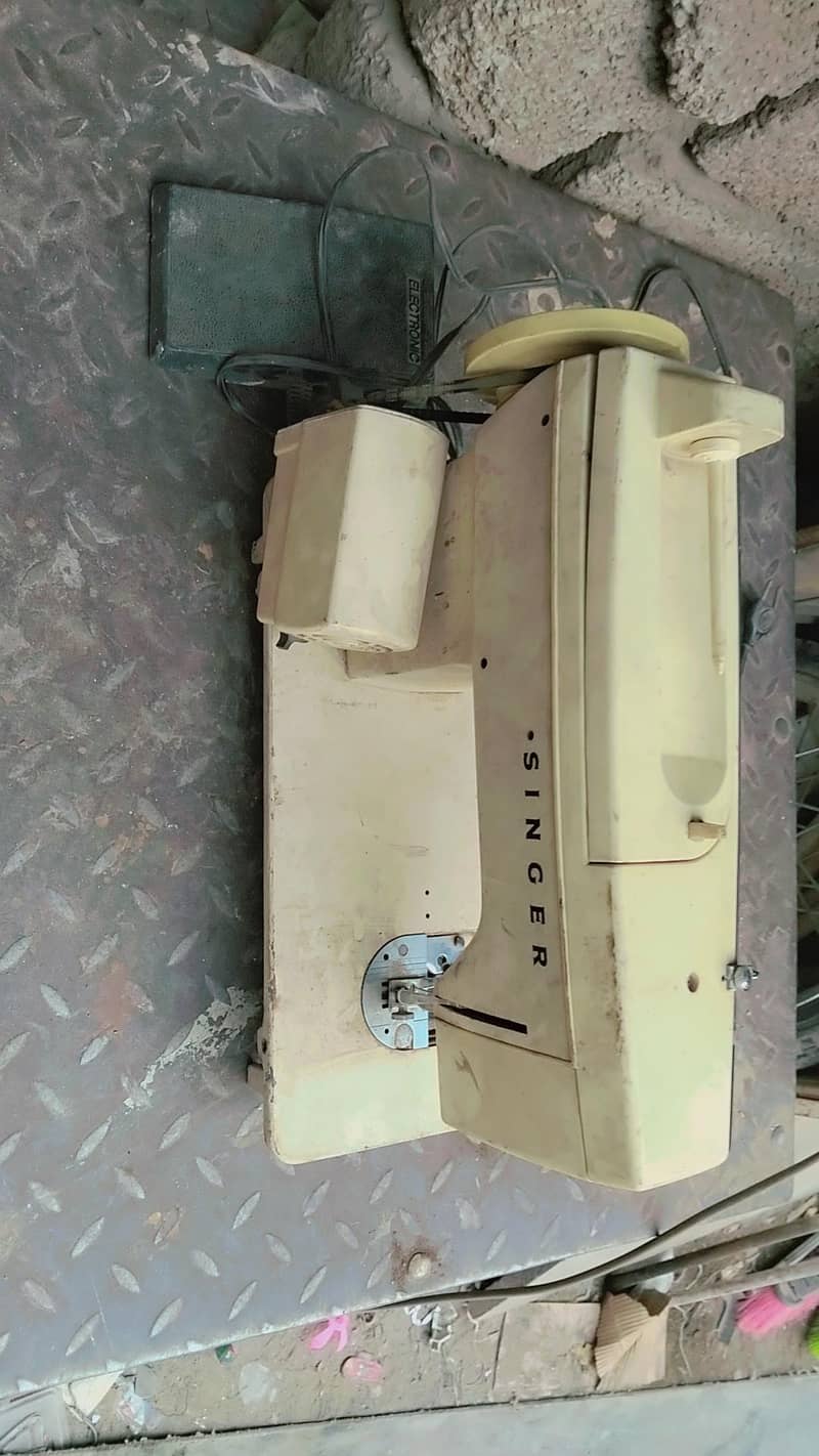 singer slai machine 1