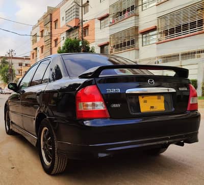 MAZDA 323  2001
