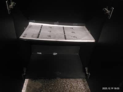 iron stand made in wood and used to