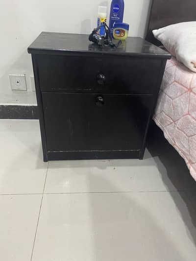 Bed with sidetaes n mattress in a very good condition n solid wood