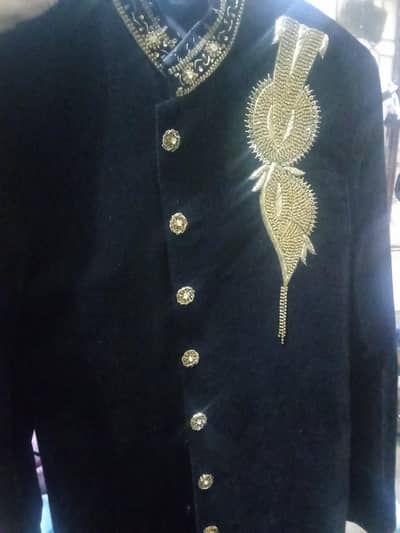 black  n golden sherwani