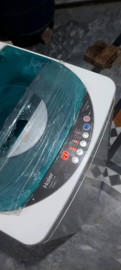haier 8.5 kg full automatic washing machine less use like new machine