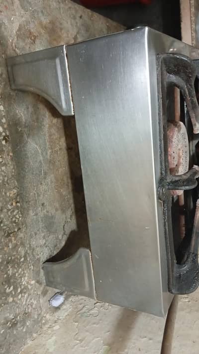 Stainless steel iron stove. . . . Good condition according to this price .