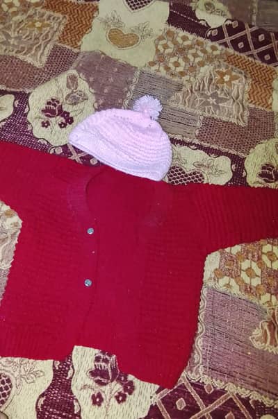 baby sewing clothesthes