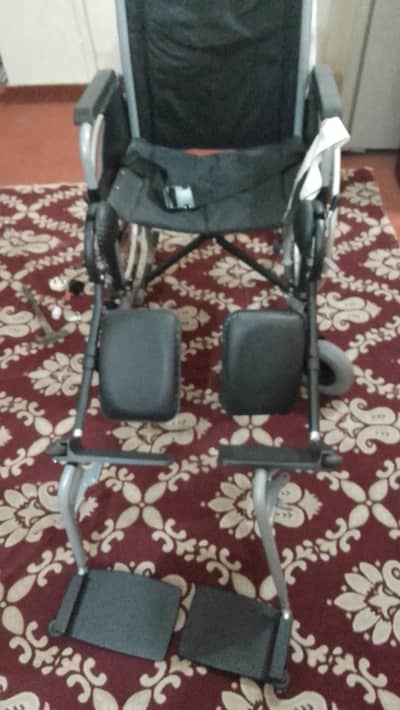 wheel chair in excellent  new condition