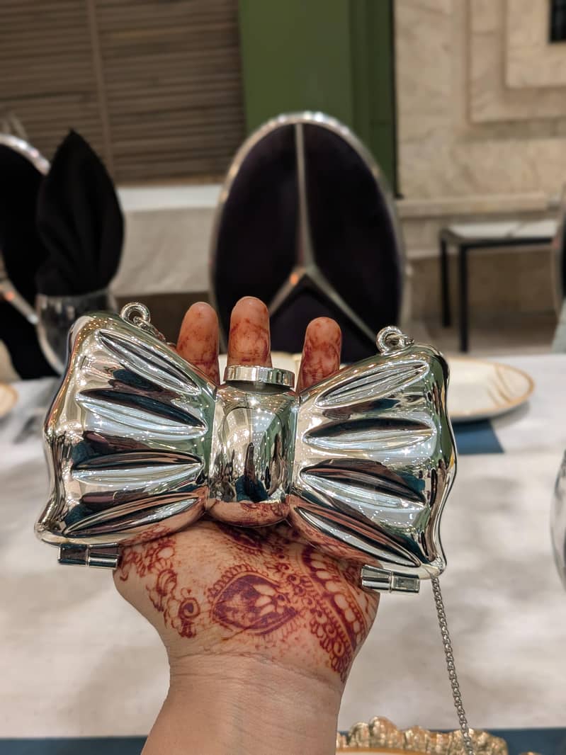 mini bow clutch silver 0