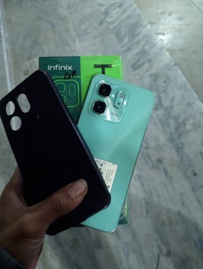 Infinix hot 50i cundion 10/10.6/128GB complete box. only 1 month used