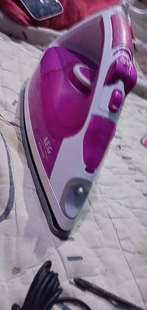 branded new iron  steam option available