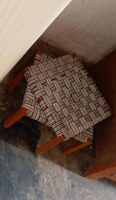 "Traditional Hand-Woven iron Peerhi. "