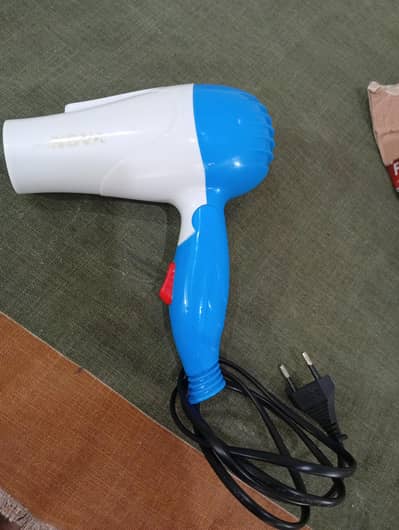 hair dry bilkul new hai imported hai bahir se mangai hai