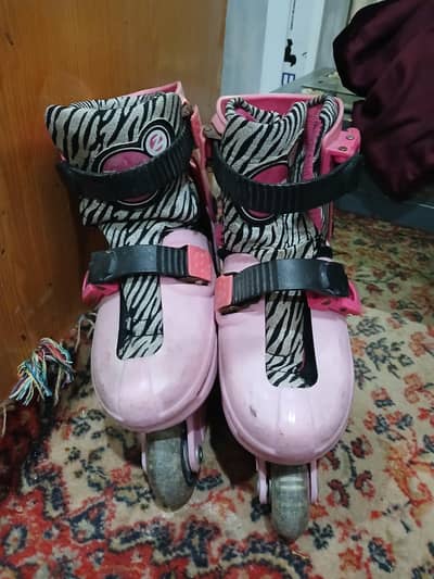 2 pairs of skating shoes