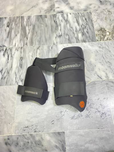 ORIGINAL MOONWALKER THIGH PAD WITH TOWEL FOR HARD BALL CRICKET.