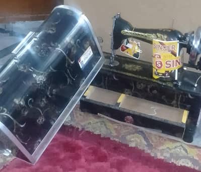 sewing machine with box for sale.