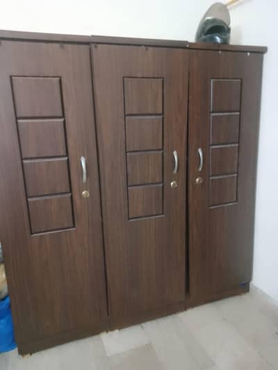 three door cupboard