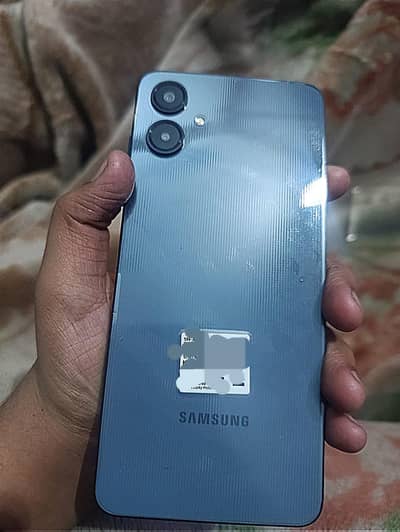 sumsung a06 1.5 month used new urgent sale  (adafter free)