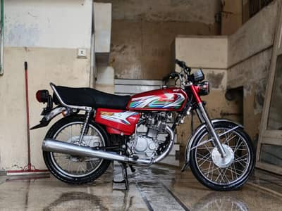 HONDA 125 FULLY TRANSPARENT STICKERED LUSH CONDITION