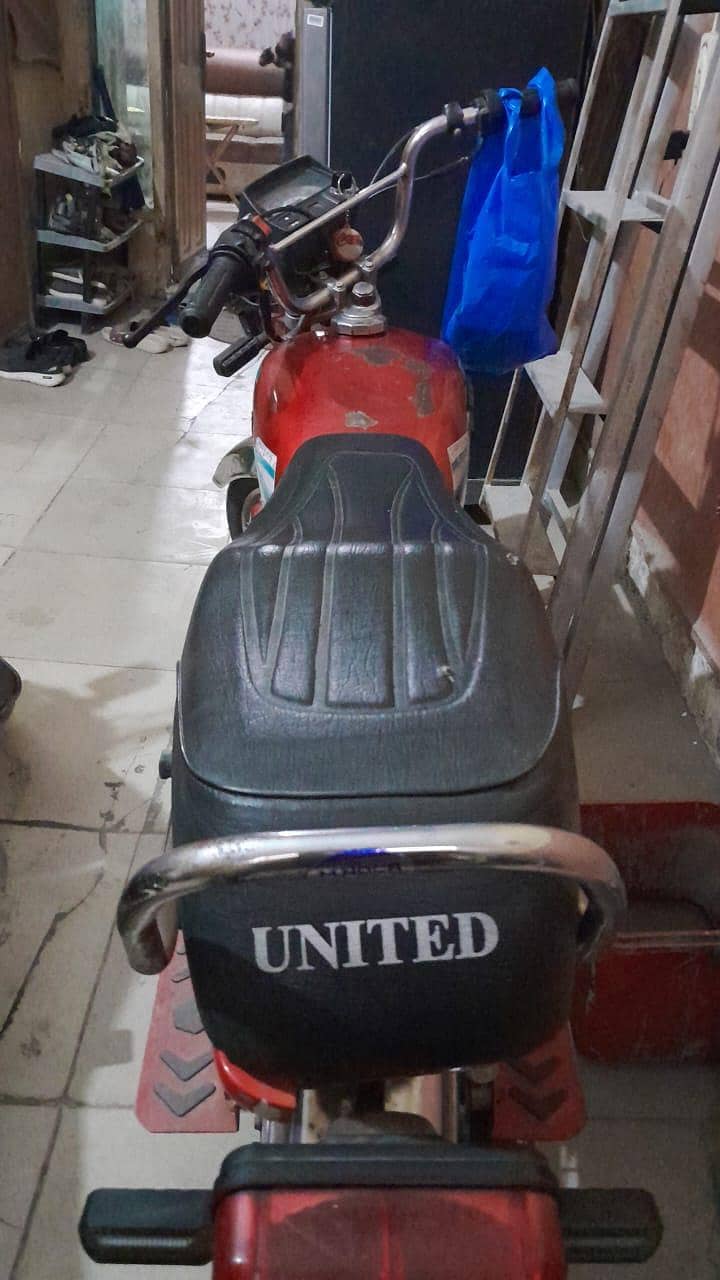 united 70cc 4