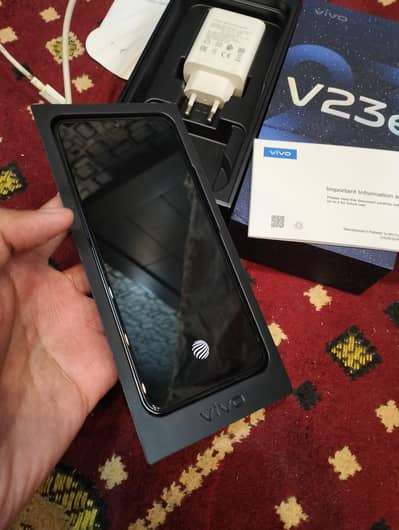 v23e 256gb exchange possible  with box charger