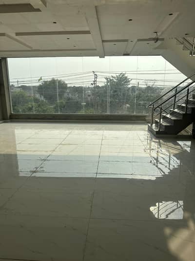 2 kanal commercial paid brand new tiled floor for rent on main road