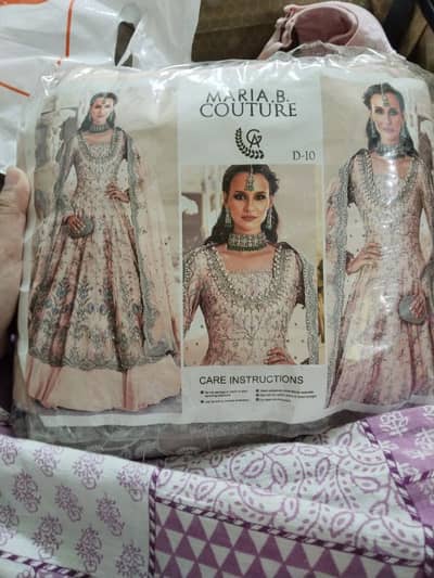 Indian Net Suit with Tilla and Crystal Embellishments*