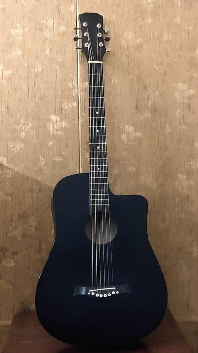 Spanish style black acoustic guitar with accessories
