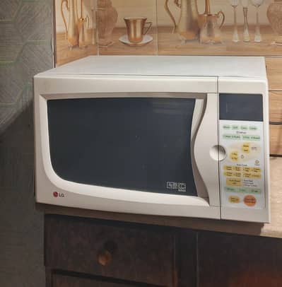 Microwave LG Brand New But Slightly Used