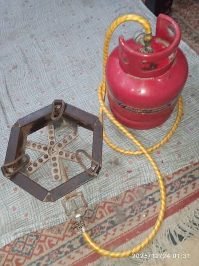 Gas cylindar + iron medium stove + pipe fitting