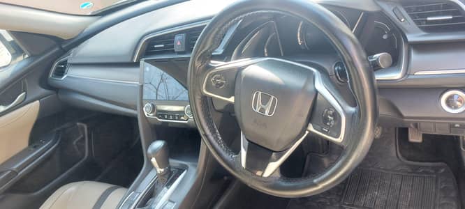 2020 model civic x. neat and clean body. like new