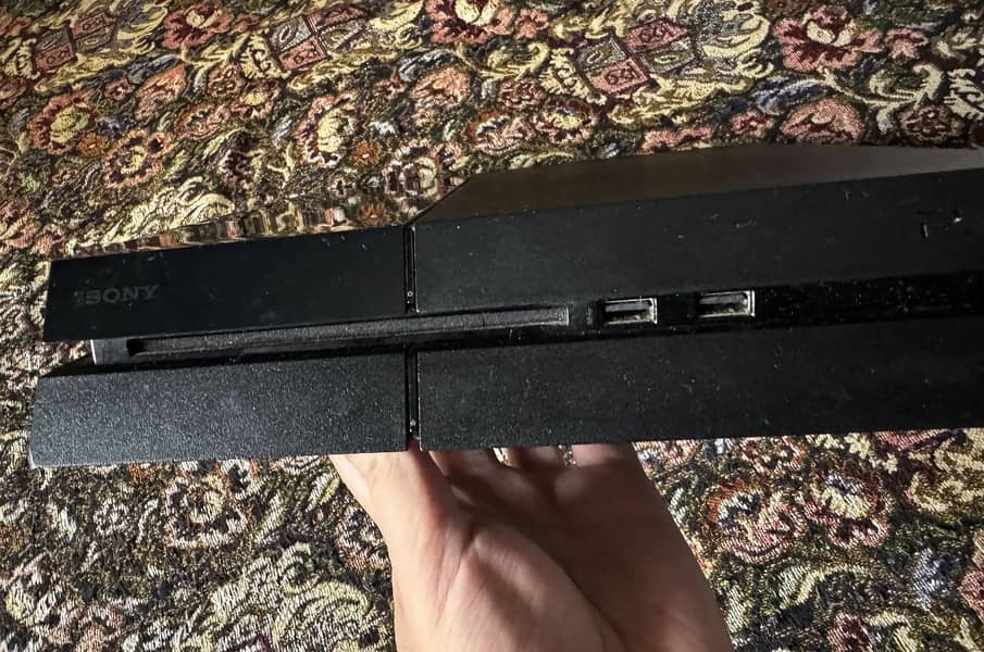 Playstation 4 Disk with a controller 4