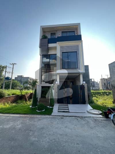 3 Marla brand new half triple storey modern style house for sale in Indigo canal homes main canal road Lahore