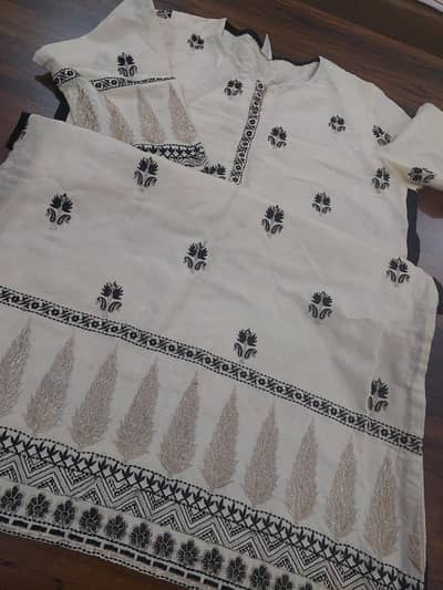 1 piece Embroidered ready to wear shirt. size Medium.