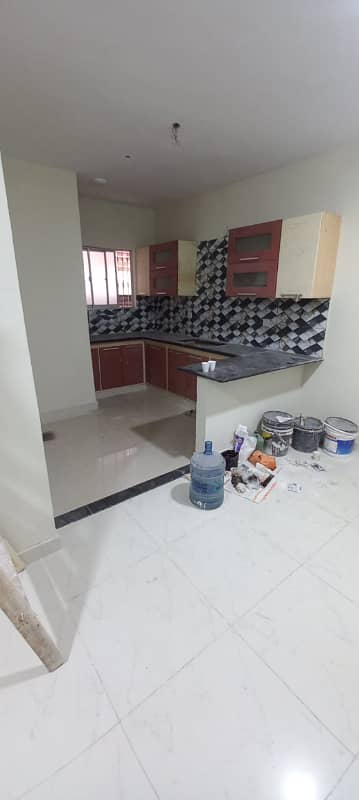 2 Bed DD flat 1st floor no mezzanine floor 900 sqrfet in DHA phase 2 ext small 24 street masjid sale demand 1.10 final shahBaz BaLoch 0322.5996882