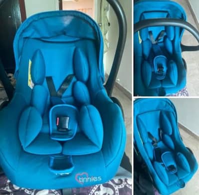 tinnies baby carry cot