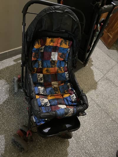 Brand New Foldable baby pram-Lightly Used with free baby Carry Coat