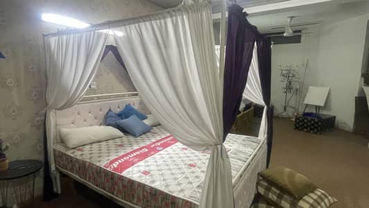 bed with matress and new curtains