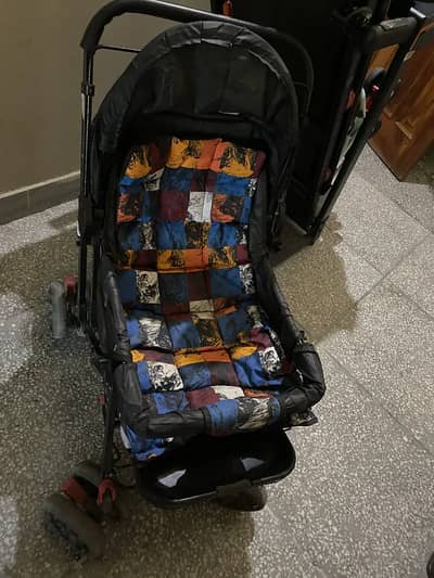 Brand New Foldable baby pram-Lightly Used with free baby Carry Coat