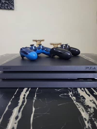 PS4 pro 1TB 4k with 2 controllers Urgent sale