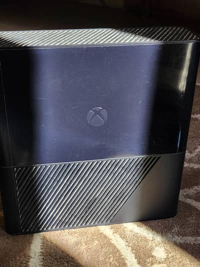 Xbox 360E (110V) mint condition with Stabilizer.