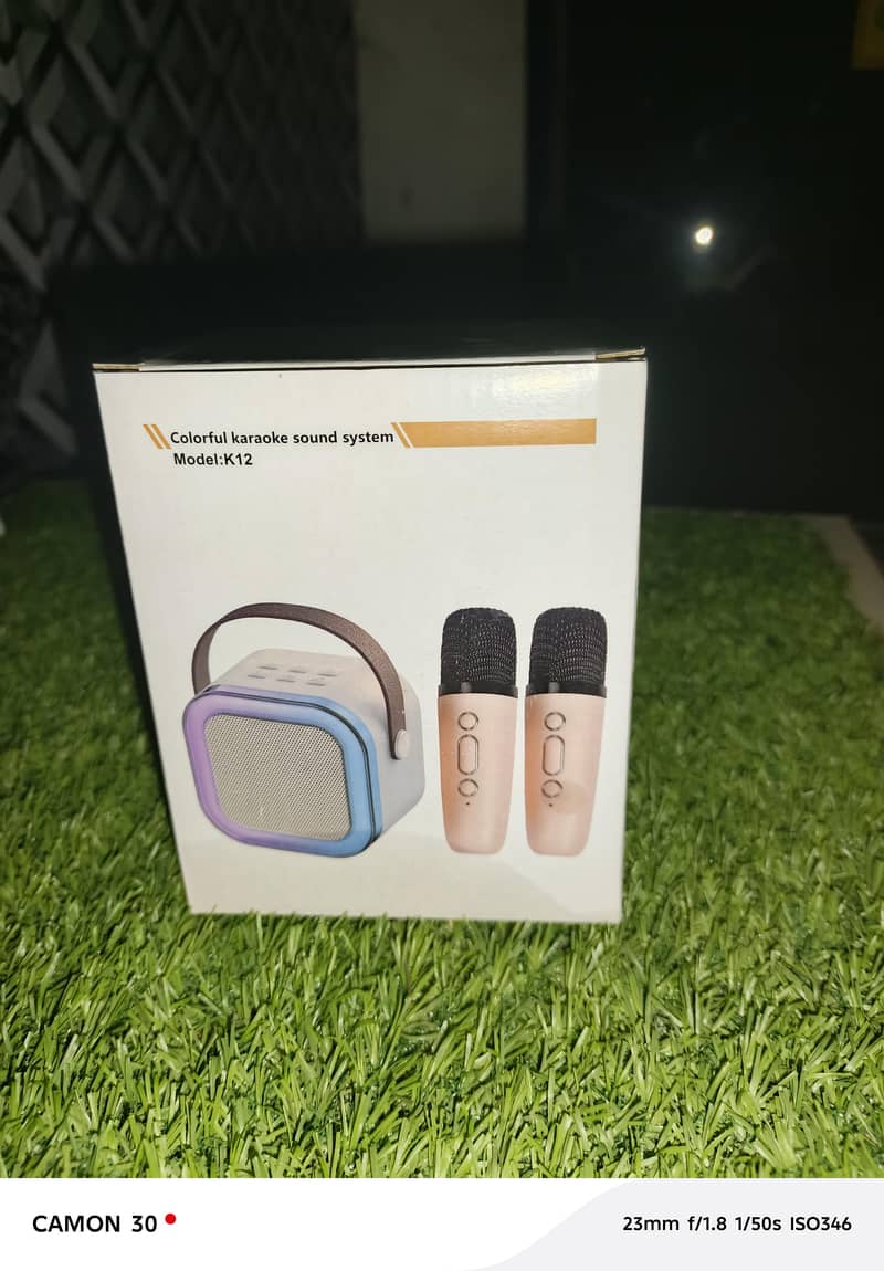 K12 Mini Audio Microphone Karaoke Family Wireless Bluetooth Speaker 1