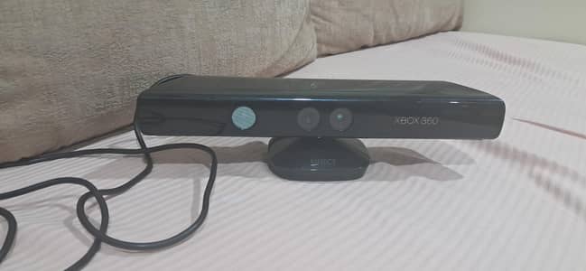 Xbox 360 with kinect sensor around 50 games.