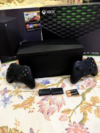 Xbox series x box open with controller