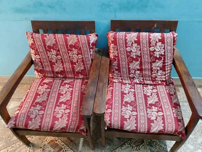 wooden sofas and table