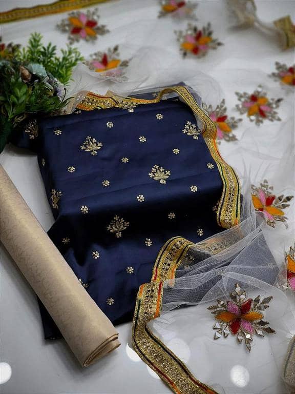 Fancy 3 Pc Unstitched Dress for Women – Shamoz Silk Shirt with Jhumka Work, Masoori Trouser & Heavy Embroidered Net Dupatta