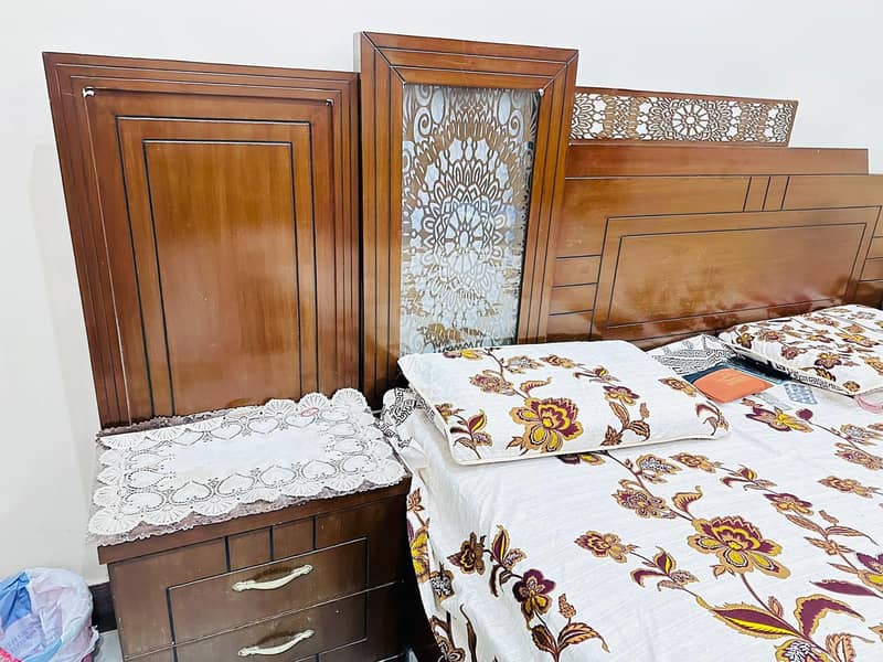 bed with side table 0