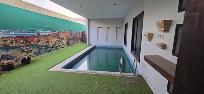 DEFENCE 500 YARDS NEW BUNGALOW FOR RENT WITH SWIMMING POOL