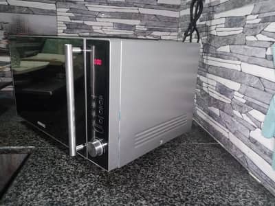microwave oven just like a new condition  urgent sale