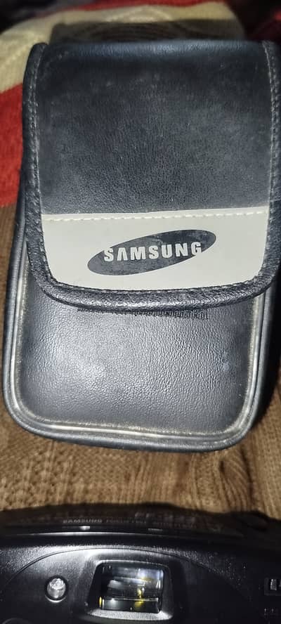 Samsung FF-222 35mm point and shoot film camera.