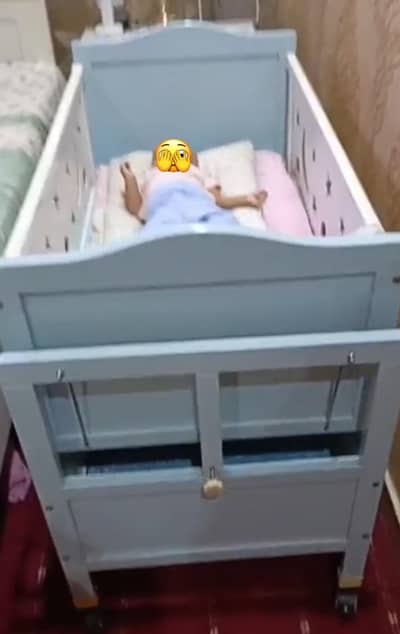 bright blue cot/crib for babies