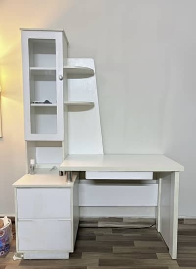 White minimalist study table with showcase shelf and drawers